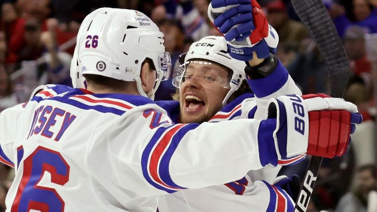 Rangers left wing Artemi Panarin (10) celebrates his second goal...