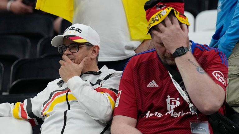 German soccer supporters reacts after the World Cup group E...