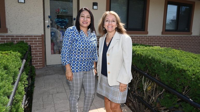 Andrea Hernandez, left, and Andrea Ramos-Topper of the EAC Network,...