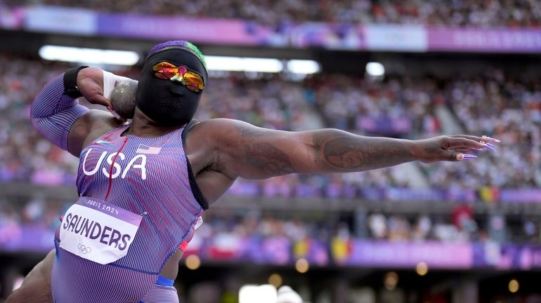 Raven Saunders, of the United States, competes during the women's...