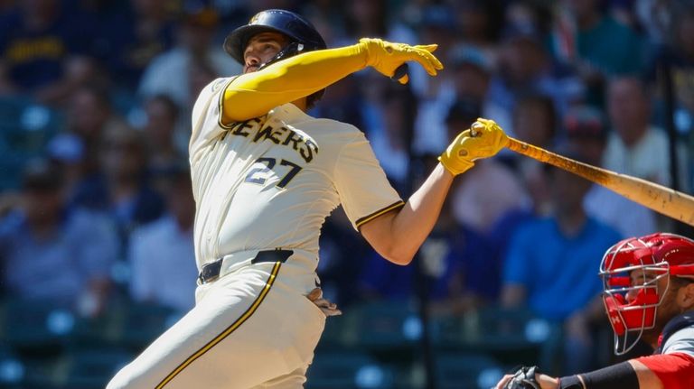 Milwaukee Brewers Willy Adames (27) watches his three-run home run...