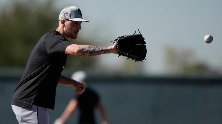 Chicago White Sox relief pitcher Garrett Crochet participates in spring...