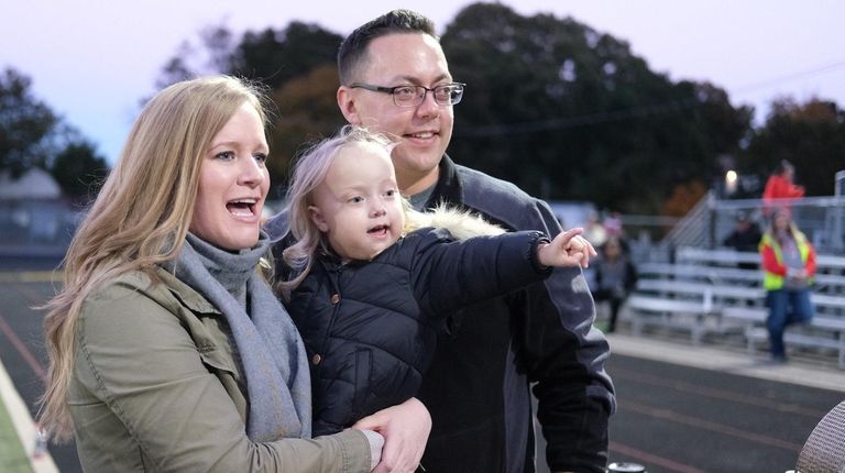 Madison Anderson of Selden 3, with her parents Kristen and...