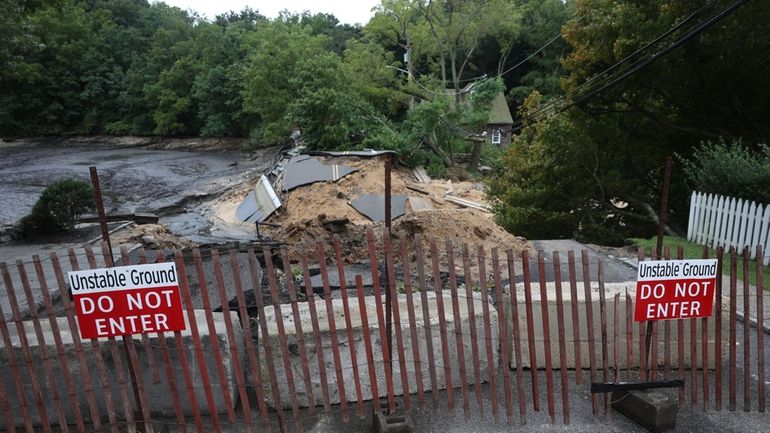 Heavy rain destroyed the Mill Pond Dam limiting access to...