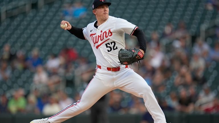 Minnesota Twins starting pitcher Zebby Matthews delivers during the first...