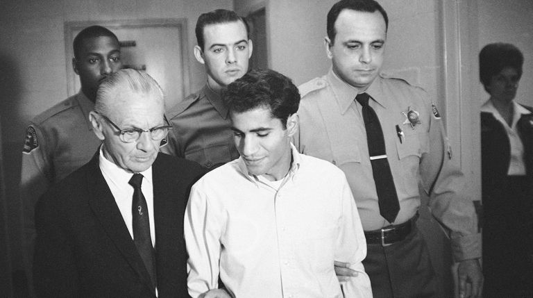 Sirhan Bishara Sirhan, who shot Sen. Robert F. Kennedy, is escorted...