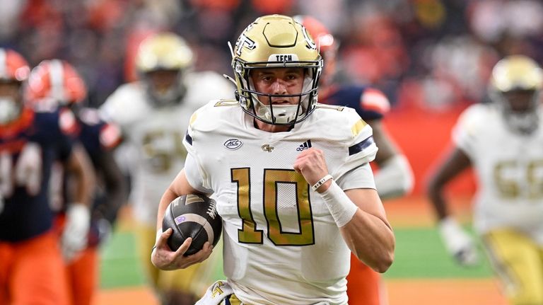 Georgia Tech quarterback Haynes King (10) runs for a touchdown...