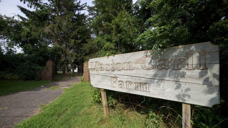 The gate to the Marion Carll Farm in Commack. Carll's...