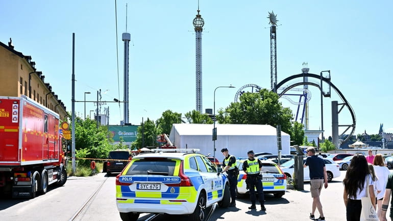 Police cordon off the Gröna Lund amusement park in Stockholm,...