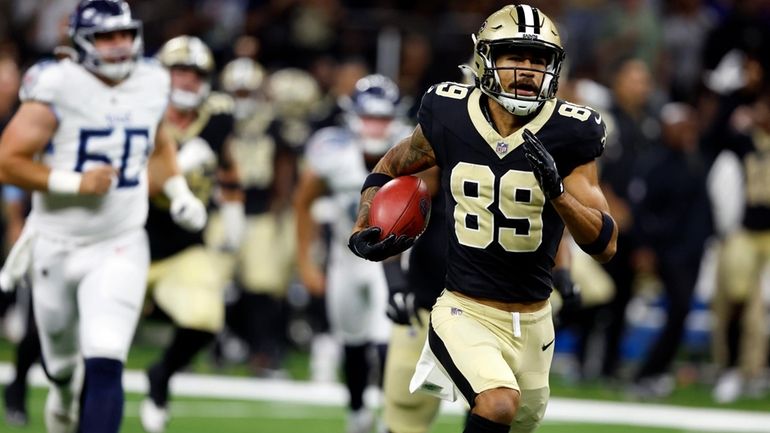 New Orleans Saints' Samson Nacua (89) returns a missed field...