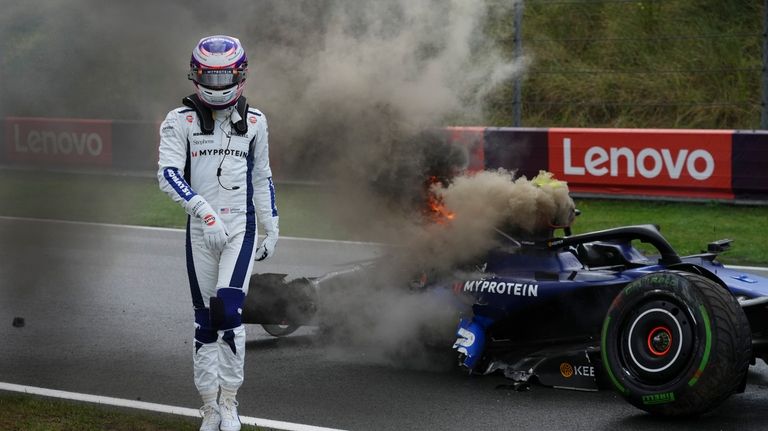 Williams driver Logan Sargeant of the US walks away from...