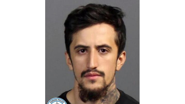 This booking photo provided by the Aurora, Colo., Police Department...