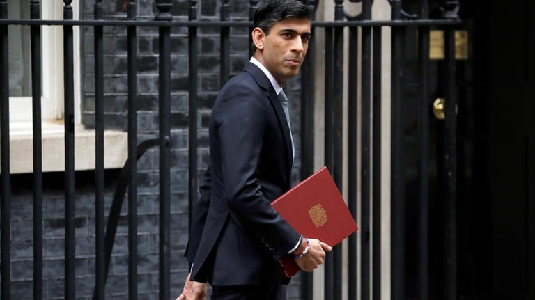 British Chancellor of the Exchequer Rishi Sunak leaves number 11...