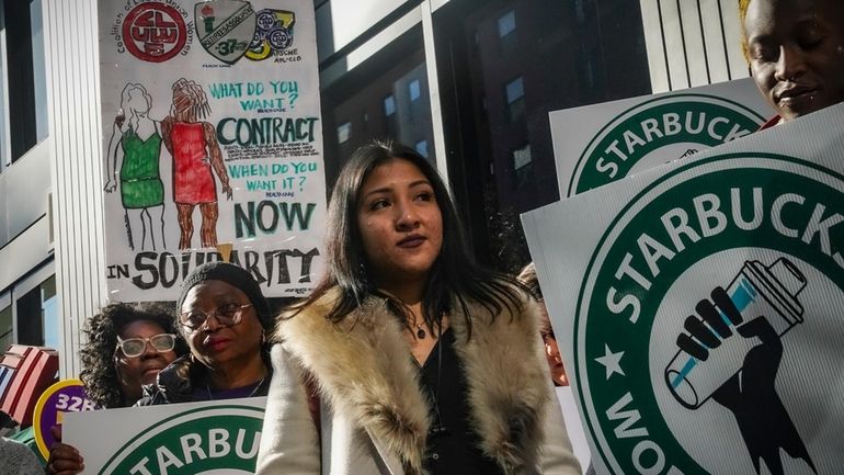 A coalition of unions and supporters join Starbucks workers at...