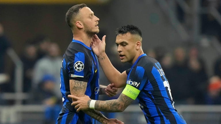 Inter Milan's Marko Arnautovic, reacts after missing to score besides...