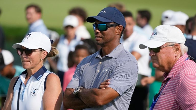 TIgers Woods watches his son Charlie Woods during the second...