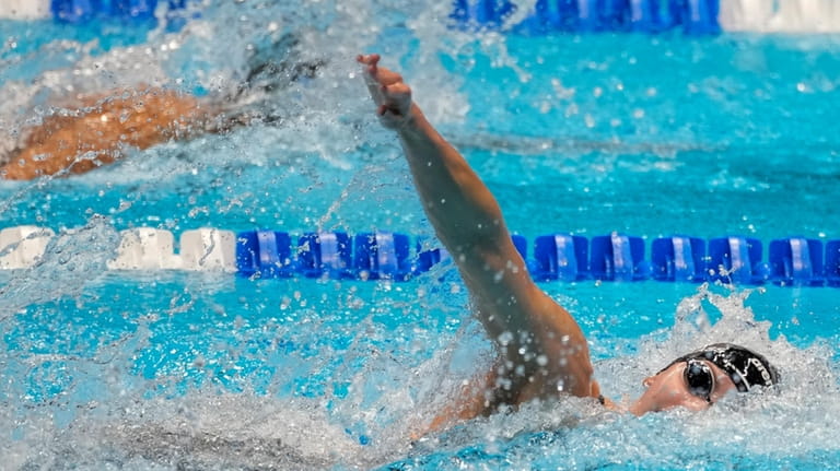 Kate Douglass swims during the Women's 100 freestyle finals Wednesday,...