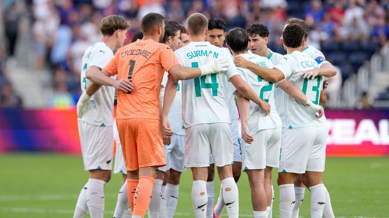 New Zealand players huddle prior to a friendly soccer match...