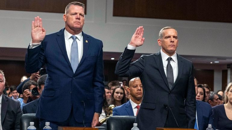 U.S. Secret Service Acting Director Ronald Rowe, left, and FBI...