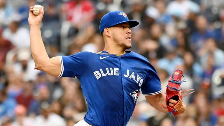 Toronto Blue Jays pitcher Jose Berrios (17) works against the...
