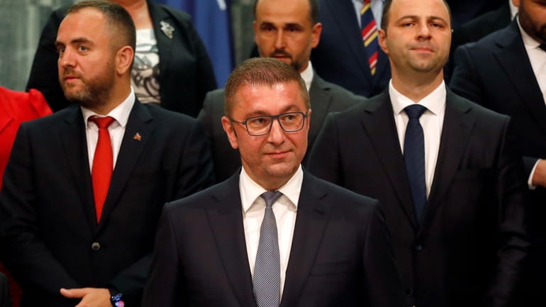 Hristijan Mickoski, center front, the new North Macedonia's prime minister...