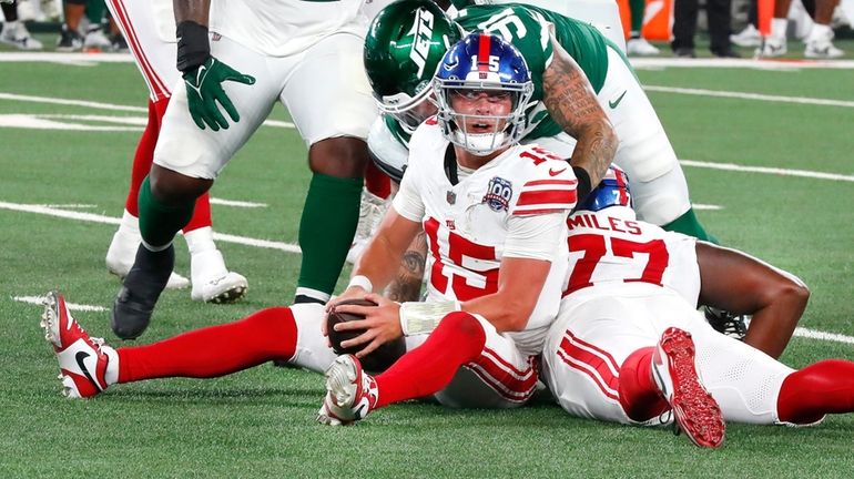 Giants quarterback Tommy Devito after being sacked by Jets defensive...