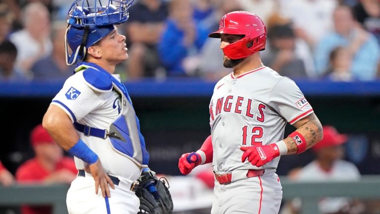 Los Angeles Angels' Kevin Pillar (12) crosses the plate past...