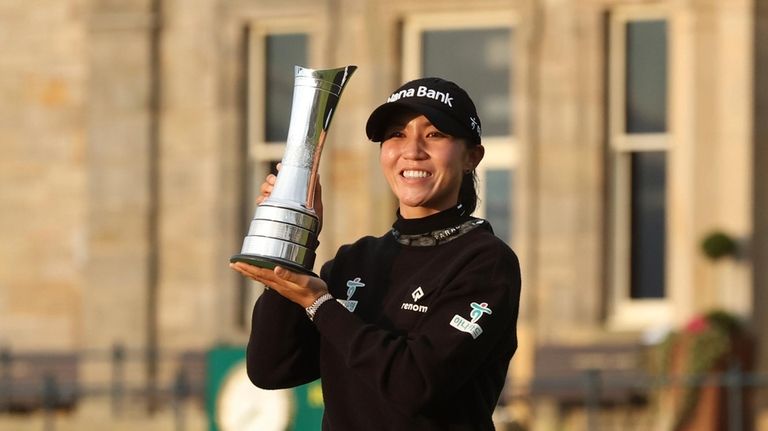 Lydia Ko of New Zealand, poses for the media with...