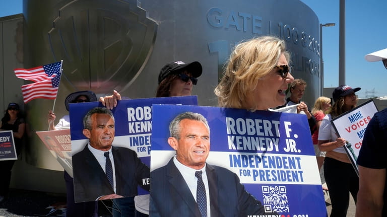 Supporters of Presidential candidate Robert F. Kennedy Jr. protest outside...