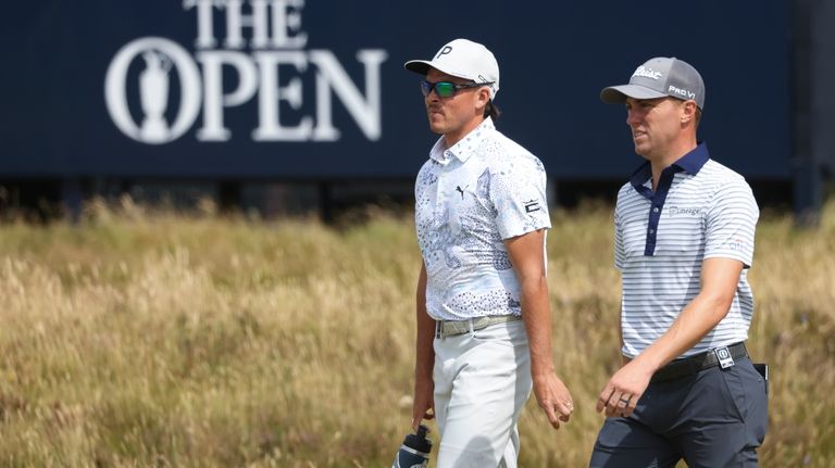 Justin Thomas, right, and Rickie Fowler of the United States...