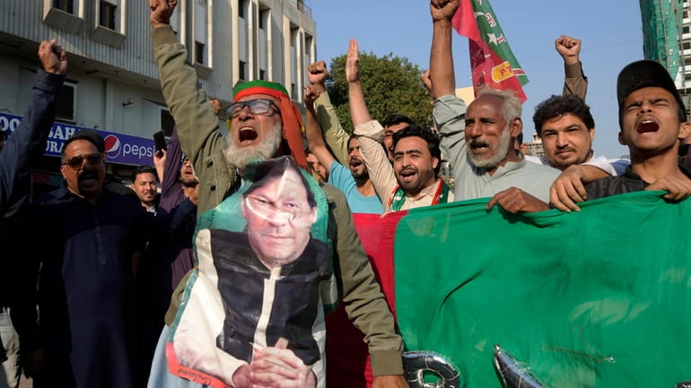 Supporters of Pakistan's Former Prime Minister Imran Khan's party 'Pakistan...