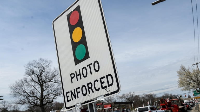 A red light camera at Indian Head Road and Jericho Turnpike in...