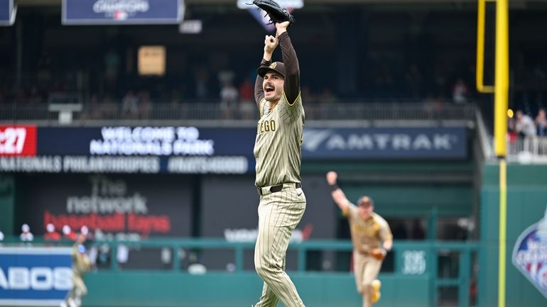 San Diego Padres starting pitcher Dylan Cease celebrates his no-hitter...