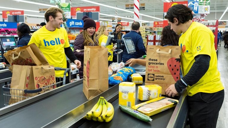 Lidl workers at the West Babylon store on Sunrise Highway in...