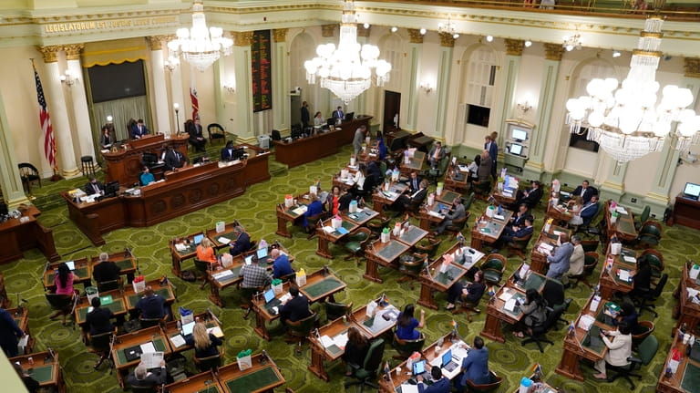 Members of the California state Assembly meet at the Capitol...