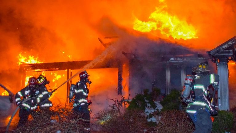 Firefighters at the blaze at a home on Dorchester Road...