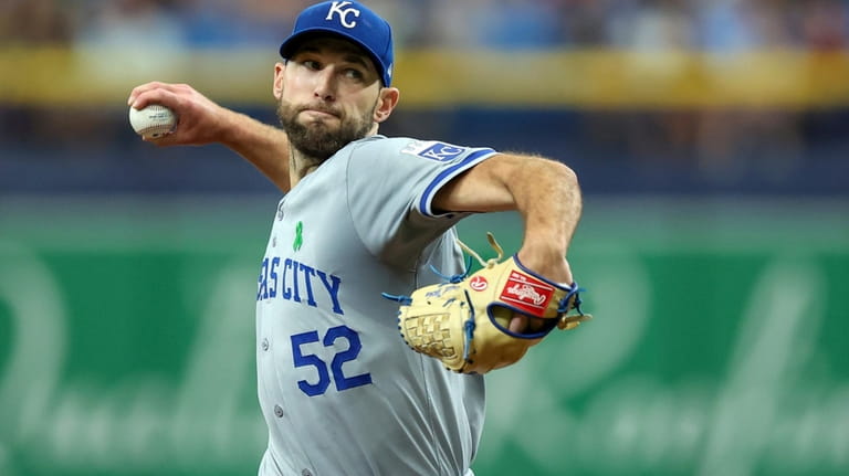 Kansas City Royals starting pitcher Michael Wacha throws against the...