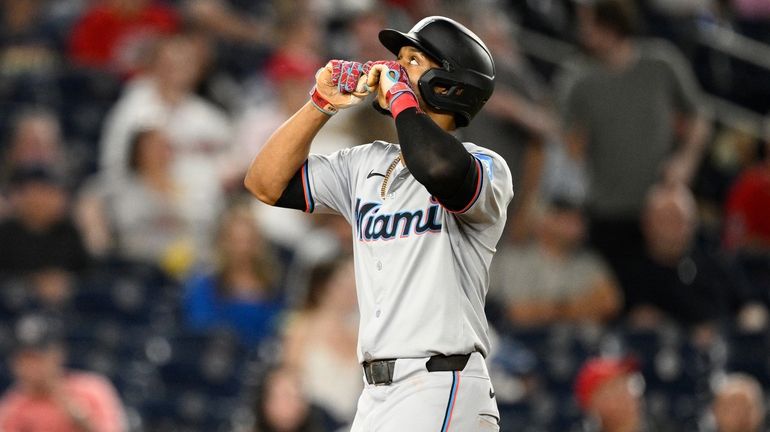 Miami Marlins' Otto Lopez celebrates after his home run during...