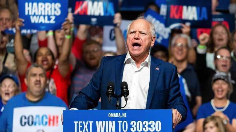 Democratic vice presidential nominee Minnesota Gov. Tim Walz speaks at...