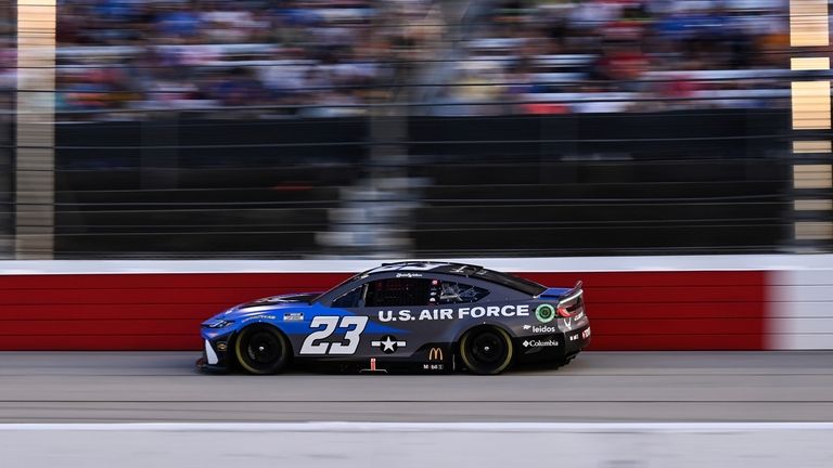 Bubba Wallace steers down the front stretch during a NASCAR...