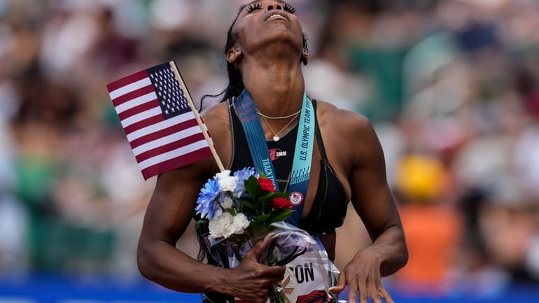 Alaysha Johnson reacts to a second place during the women's...