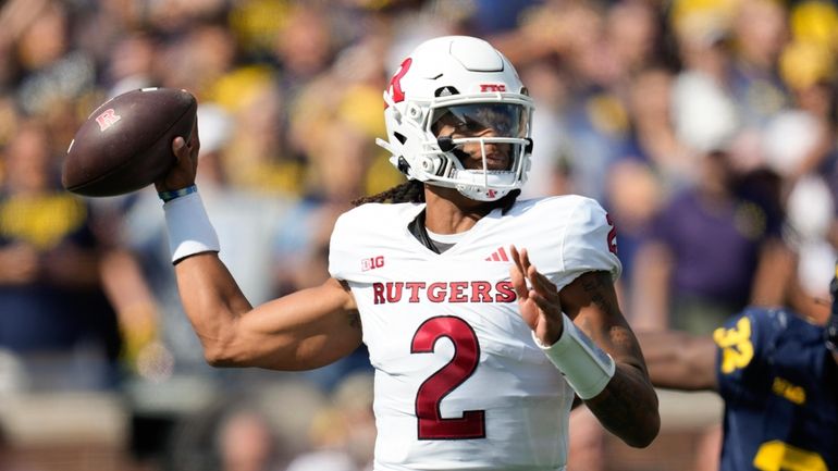 Rutgers quarterback Gavin Wimsatt (2) throws against Michigan in the...