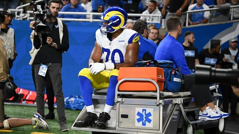 Los Angeles Rams offensive tackle Joe Noteboom (70) rides a...