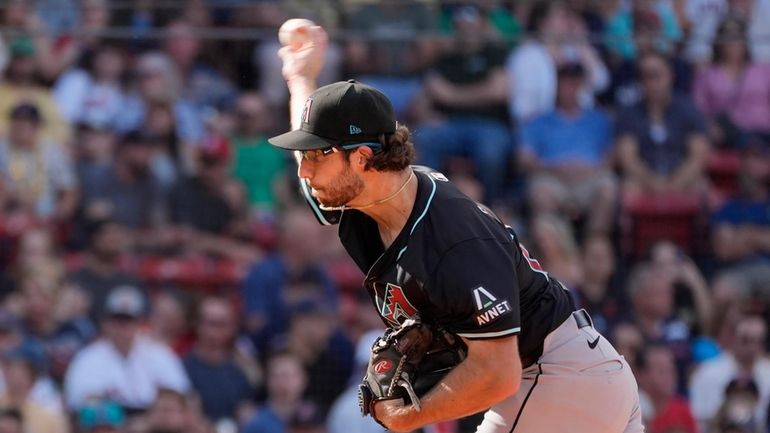 Arizona Diamondbacks starting pitcher Zac Gallen throws during the first...