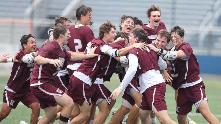 Garden City celebrates its win in the New York State Class...