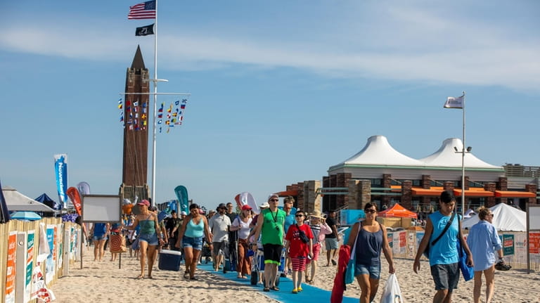 The throngs arrive Saturday morning at Jones Beach for the Bethpage...