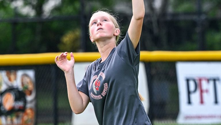 Kailyn Eaton of the Massapequa Little League softball team practices...