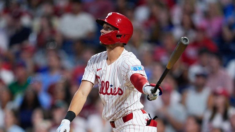 Philadelphia Phillies' Trea Turner watches his two-run home run off...