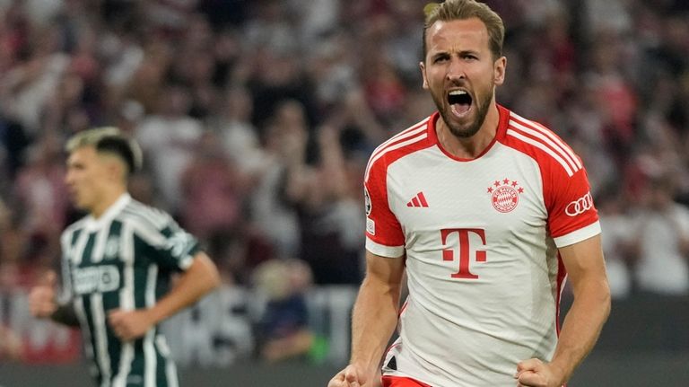 Bayern's Harry Kane celebrates after scoring his side's third goal...