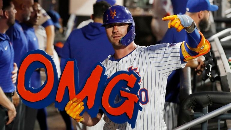 Pete Alonso of the Mets celebrates his fourth-inning home run...